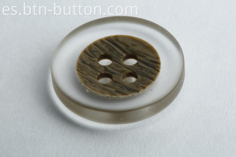 Transparent buttons on the nest surface for trench coats